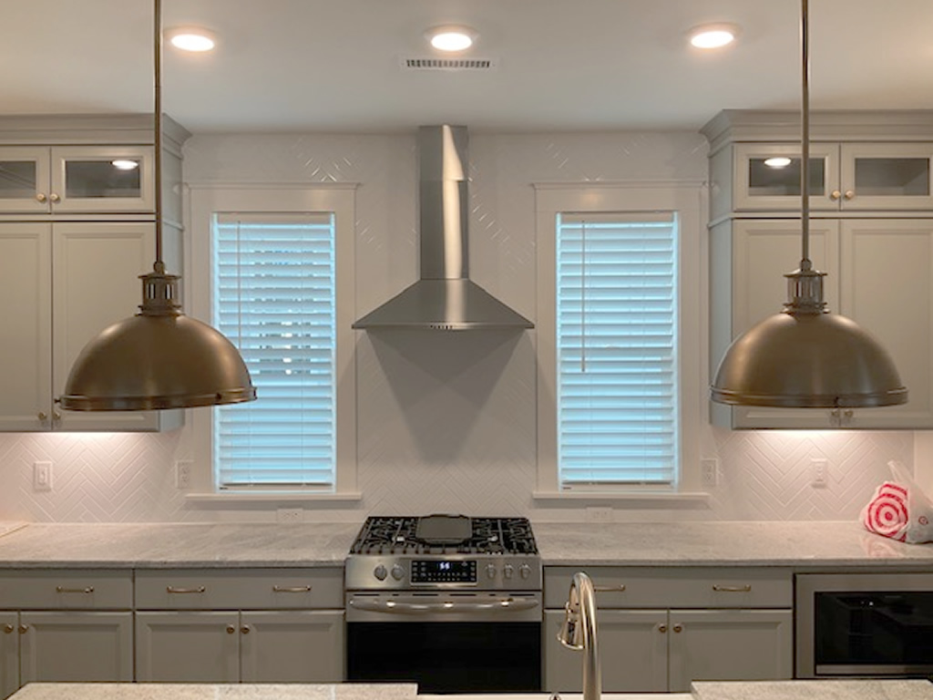 Faux Wood blinds installed in a kitchen