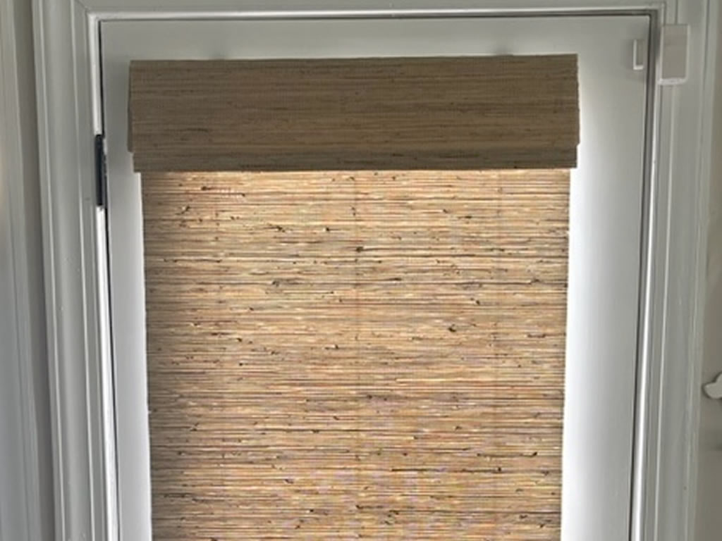 Wood blinds installed on a door