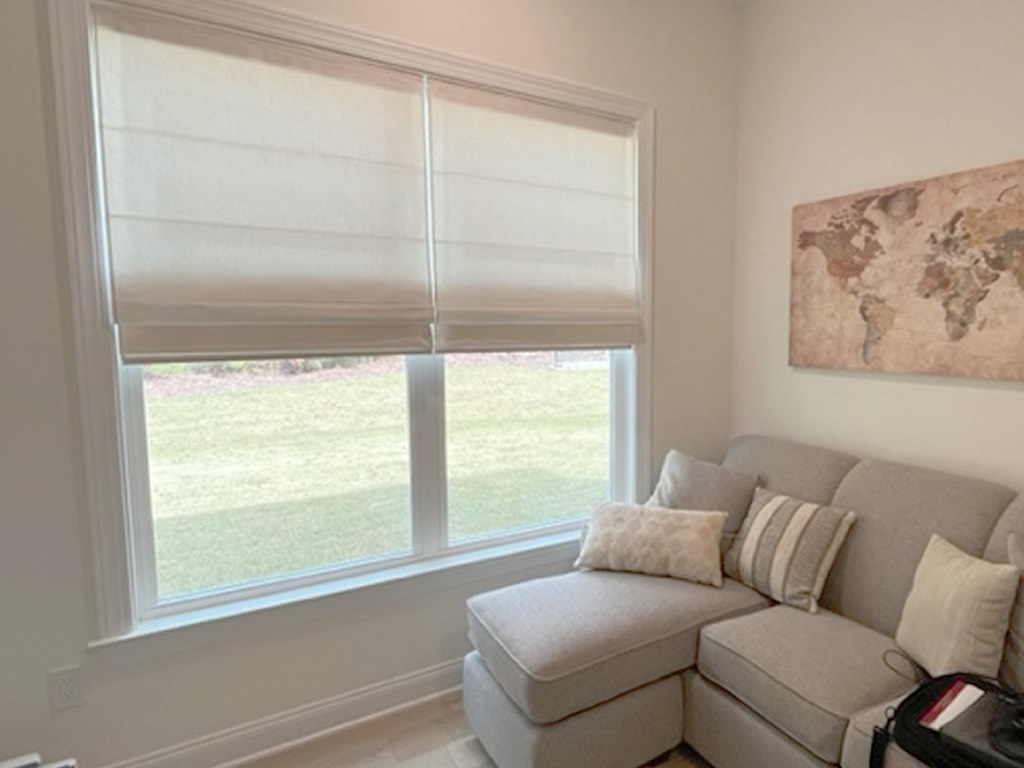 Roman shades installed in sitting room