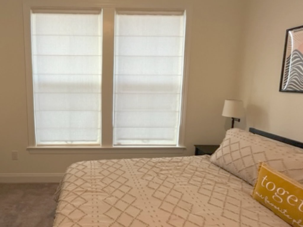 Roman shades installed in bedroom in North Carolina