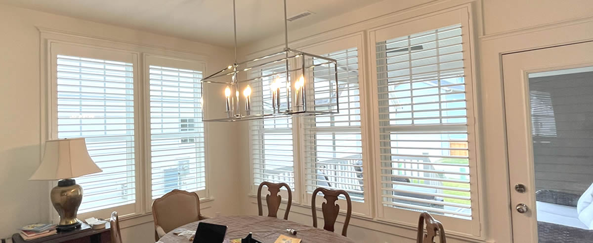 Shutters installed in a modern and elegant Dining Room in North Carolina by Prestigious Window Fashions