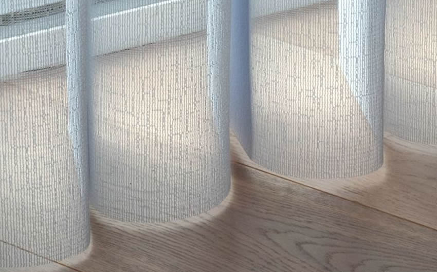 SmartDrape™ Shade on a wood floor